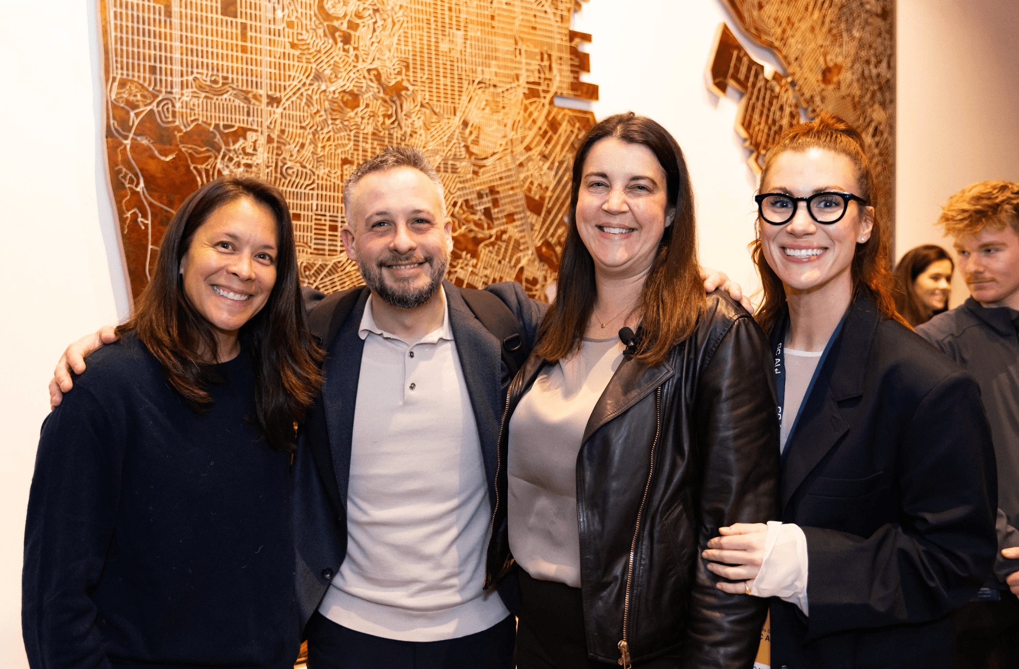 GC AI teammates posing at an office event